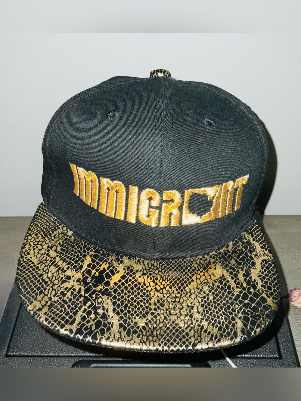 Immigrant Apparel Black and Gold Statement Strapback Hat